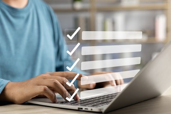 Person typing on laptop