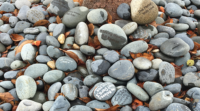 hospice stones with writing on them