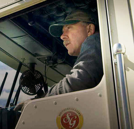 A Southern Glazer's Wine & Spirits delivery driver in a truck