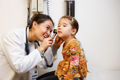 Two people taking in an office