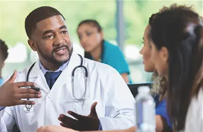 Group of medical professionals talking