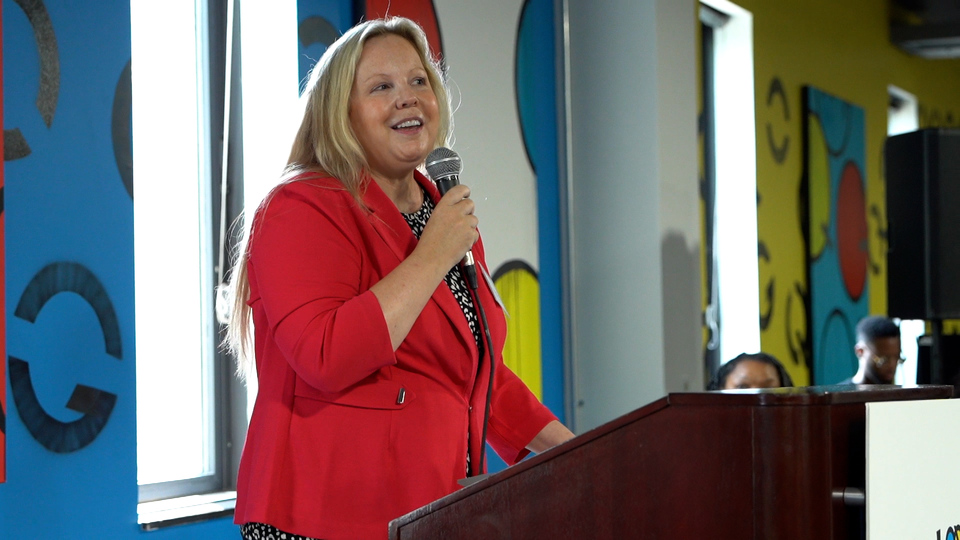 Amy Pechacek speaking at Quad MKE open house
