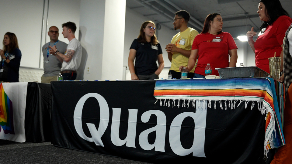 Quad BRG members at the welcome table
