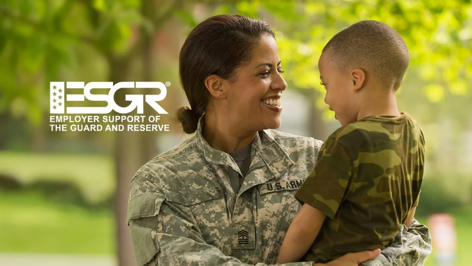 ESGR awards represented with military personnel and their child