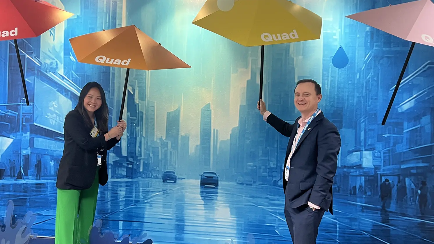 Quad corporate marketing employees having a 1:1 meeting together