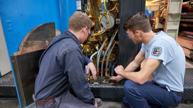 A manufacturing apprentice with a manufacturing mentor