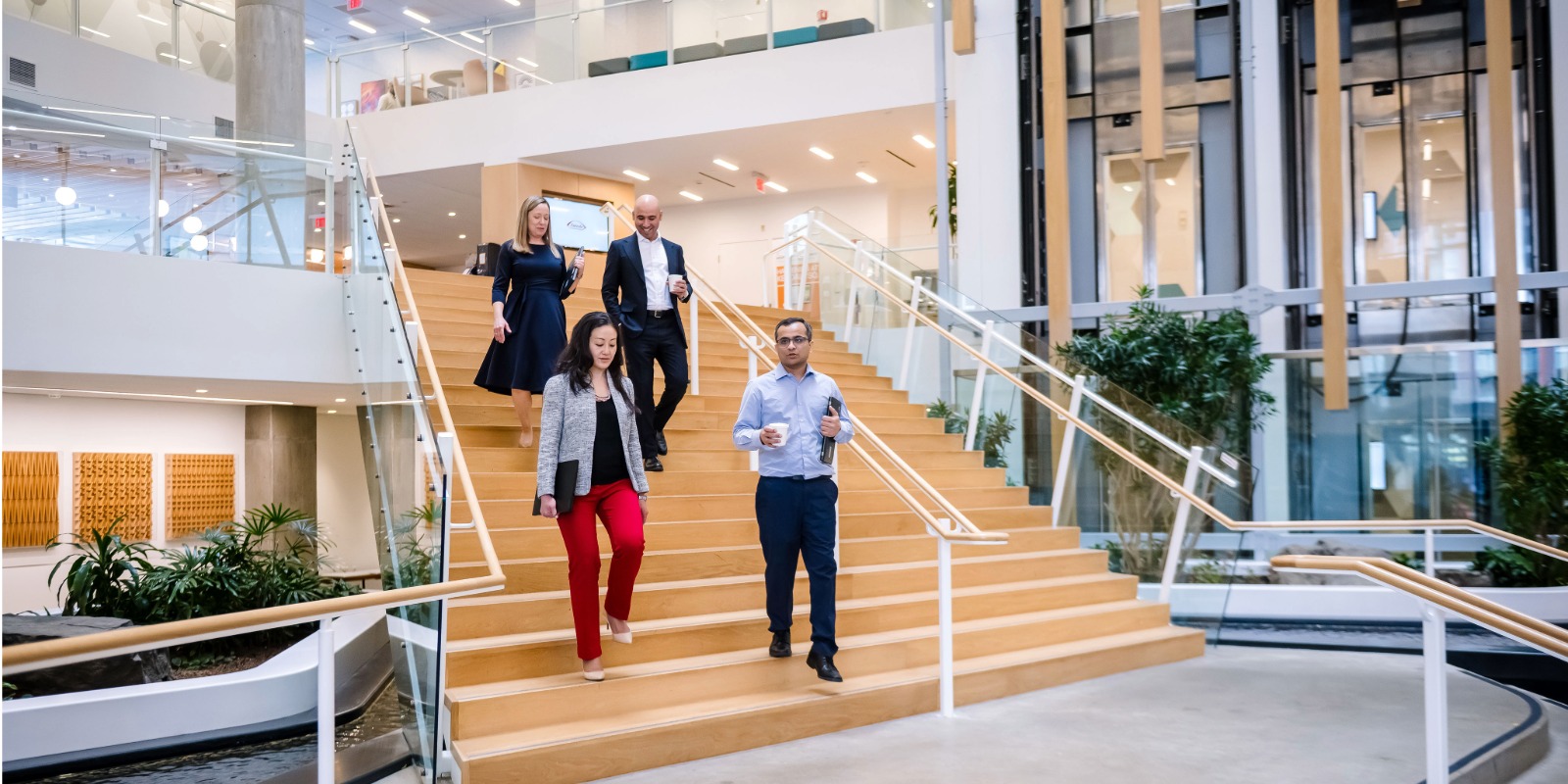 Colleagues walking through the Takeda lobby