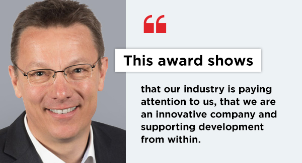 A headshot of Gunter with a quote that says This award shows that our industry is paying attention to us, that we are an innovative company and supporting development from within.