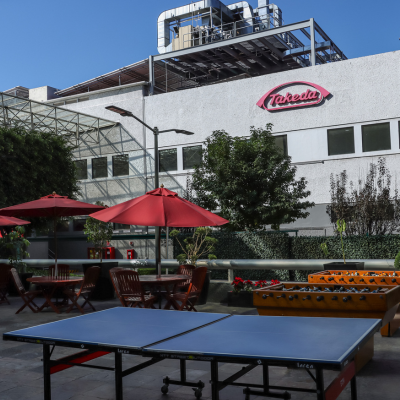 Table tennis table and flowers in a courtyard of a Takeda factory