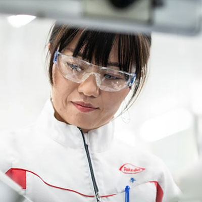 Person wearing safety glasses at work in a lab