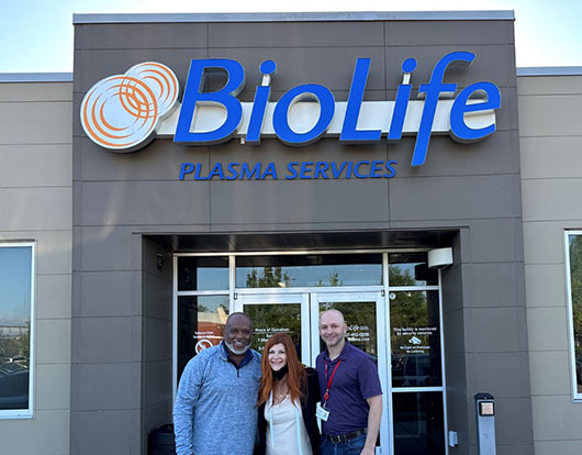 kacy with others in front of a biolife building
