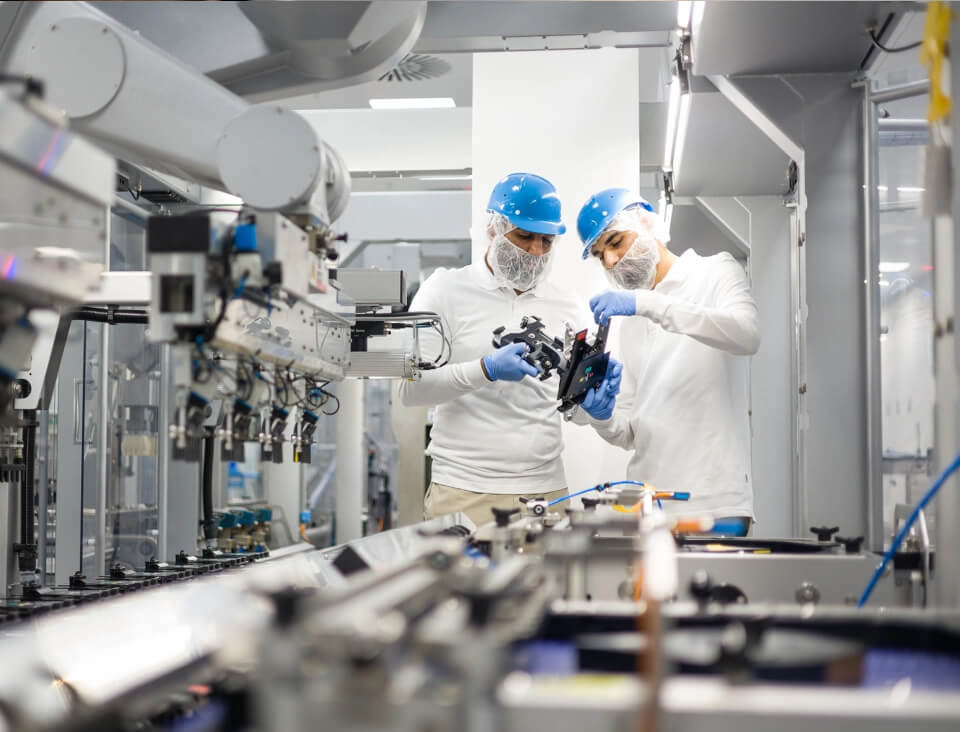 female employee retrieving a lab sample from a shelf