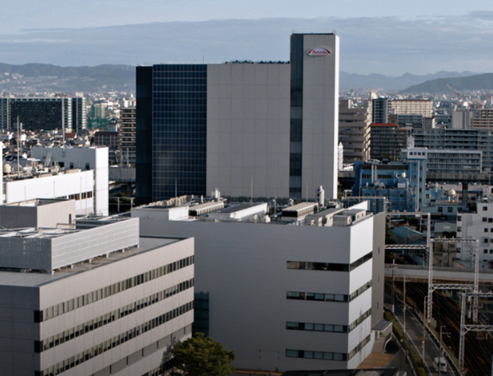 skyline view of a factory and other buildings