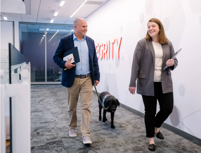 Takeda employees collaborating in a supportive work environment reflecting well-being and flexibility