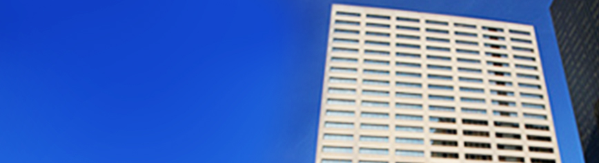 A large, Brutalist-style office building in Denver, Colorado