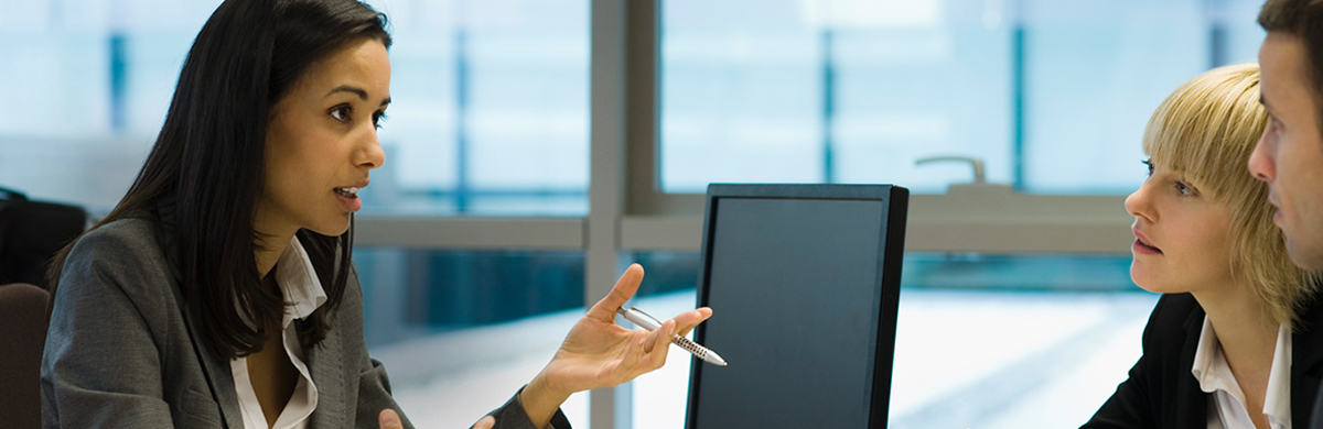 Three colleagues strategizing together