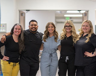a woman in the hospital holding a baby
