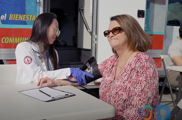 Nurse giving a blood pressure test