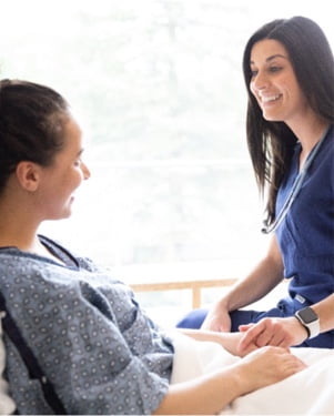 Nurse talking to patient