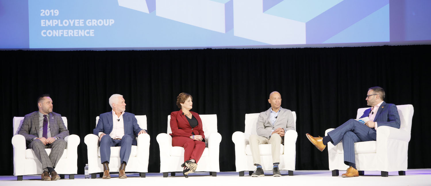 egc panelists sitting on white chairs