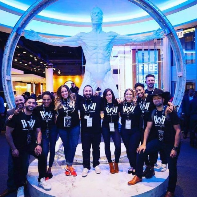 ATT Employees in front of statue