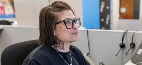 Smiling adult working