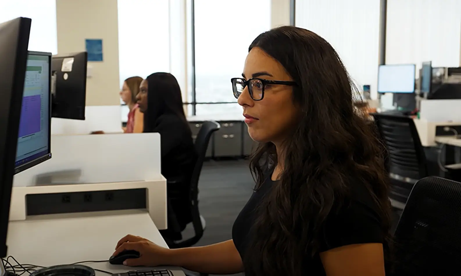Employee sitting at computer