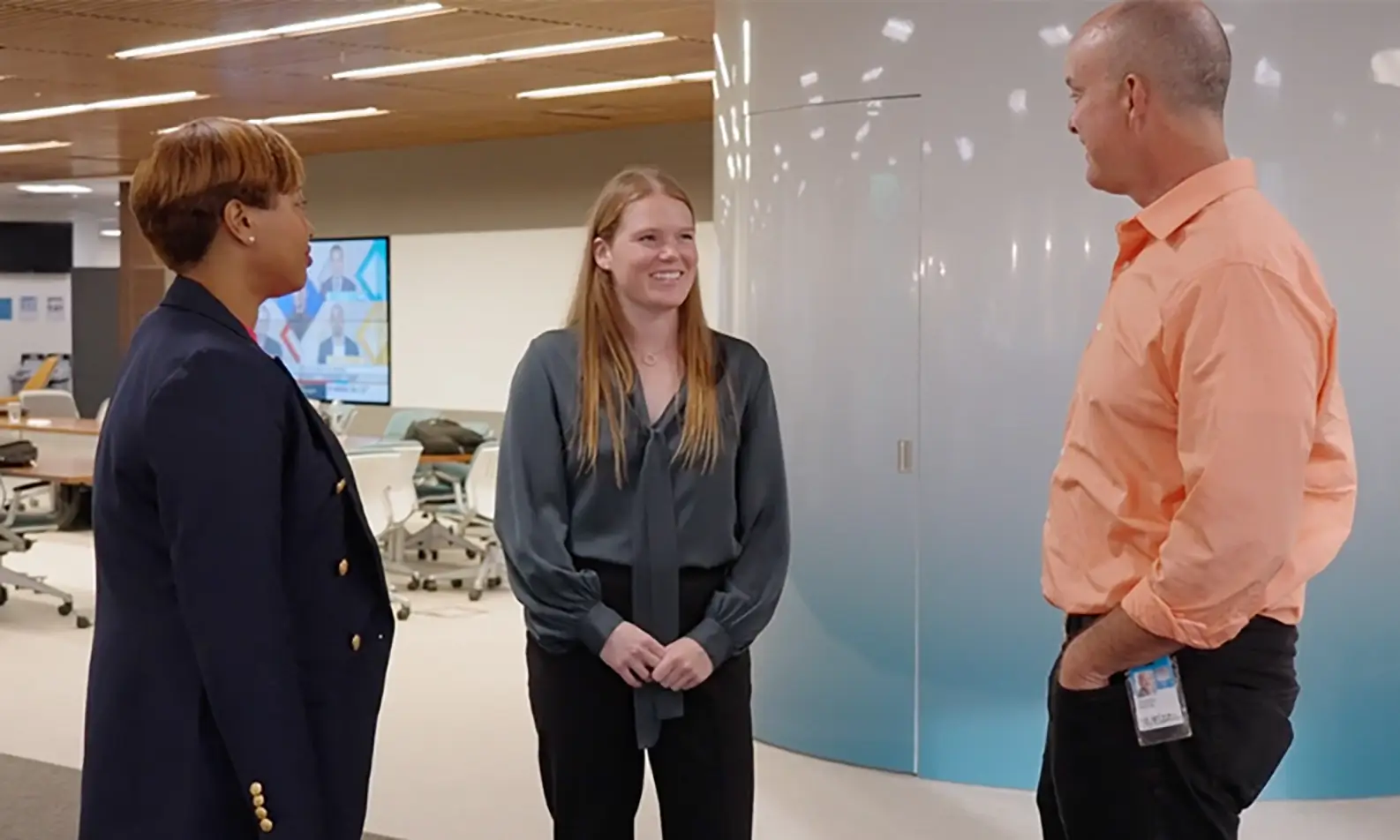Three people talking with each other
