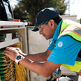 AT&T technician working with wires