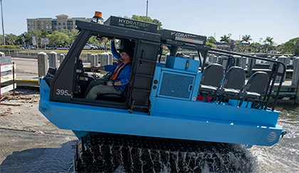 Blue truck with man driving