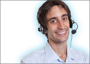 Male employee with headset on and smiling