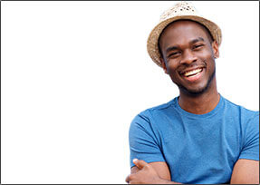 Male employee with headset on looking at a smartphone