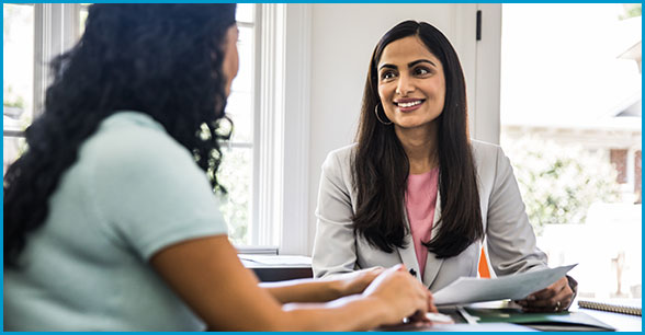 Female employee looking an object