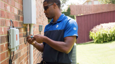 AT&T Technician working on an installation