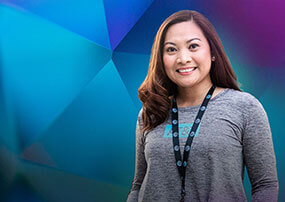 Female Asian employee smiling