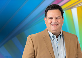 Male disabled employee smiling