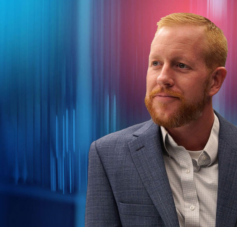 Male veteran employee smiling