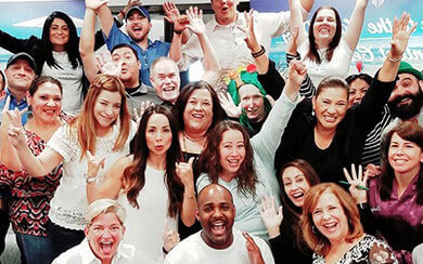 Sales employees posing for fun picture