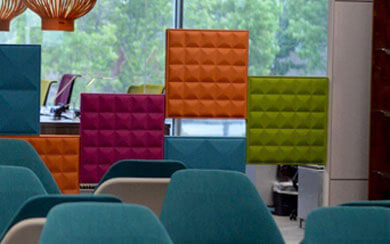 Group photo of many employees laughing and smiling