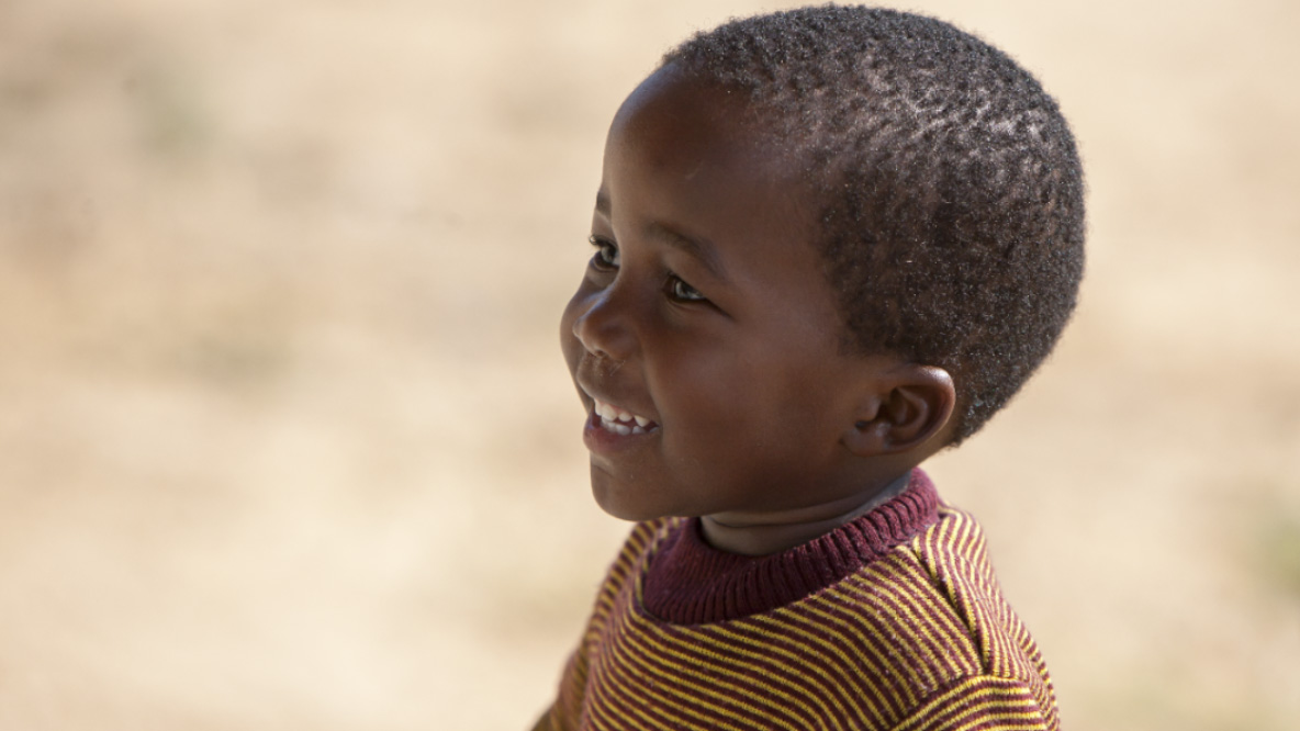 Close-up of a young child smiling