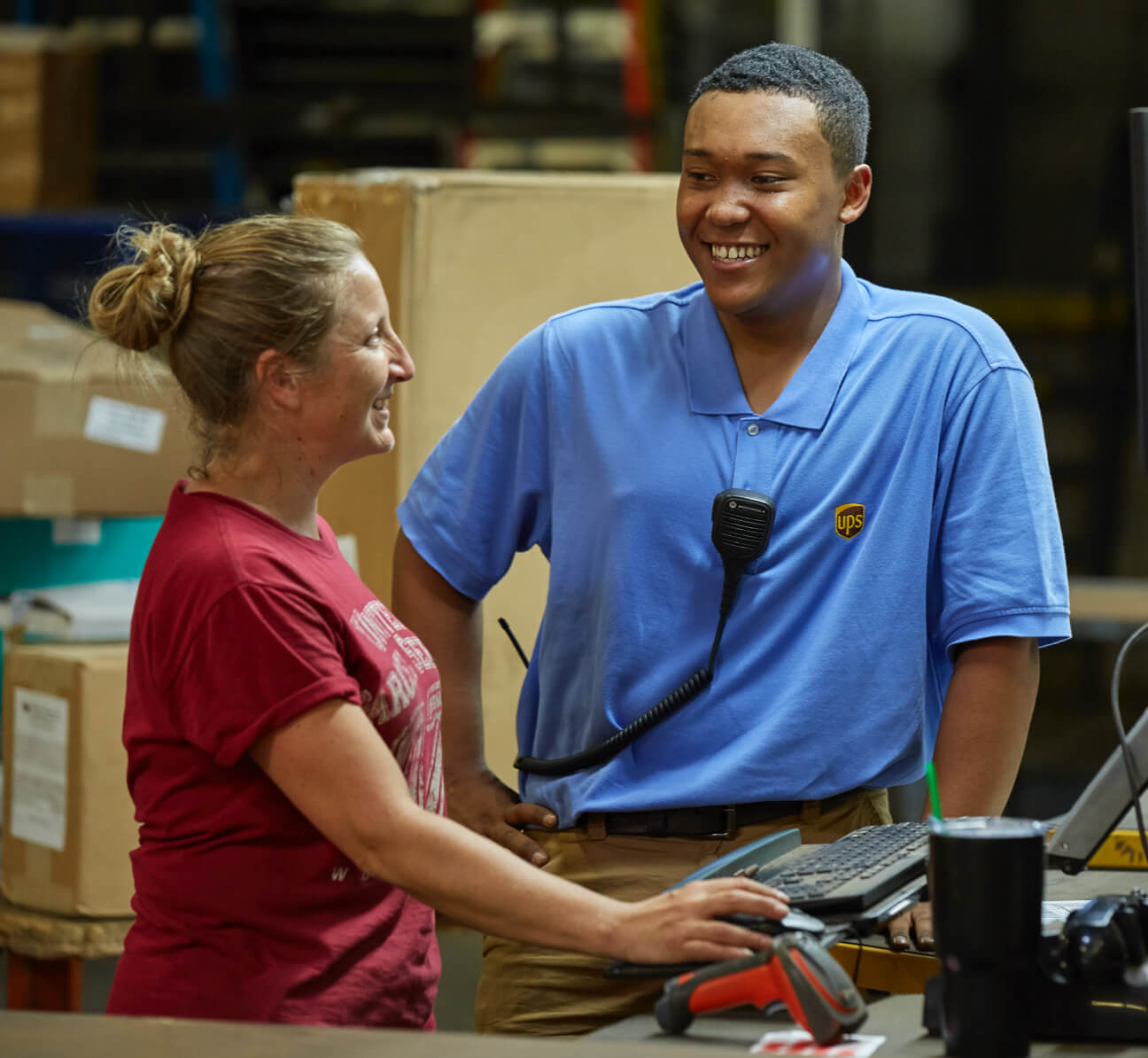 Operations manager speaking with an employee