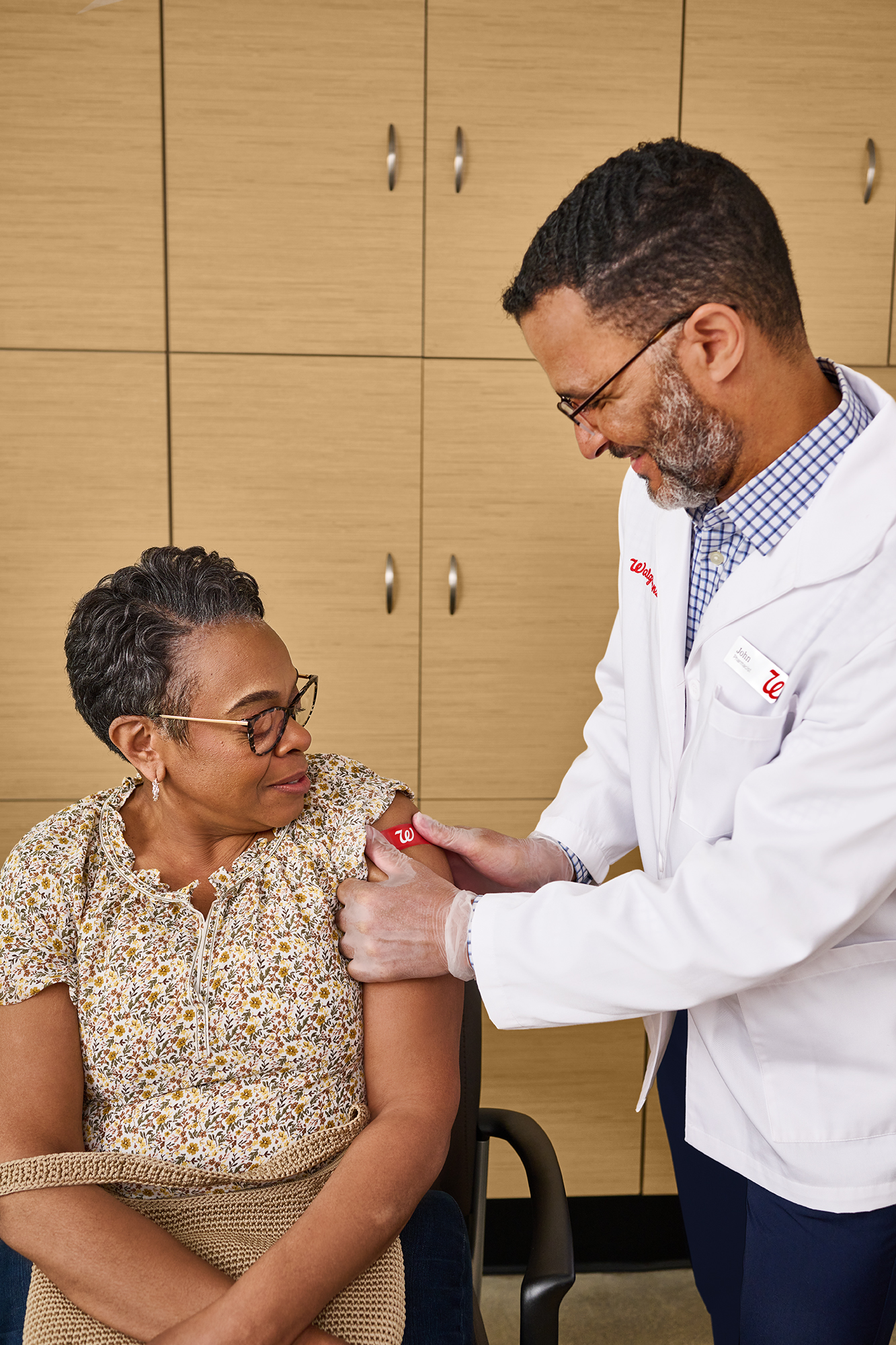 Pharmacist giving an immunization