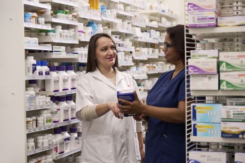 Walgreens pharmacist and technician in the pharmacy