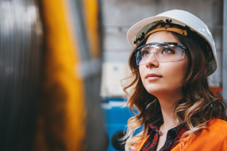 female employee with goggles on