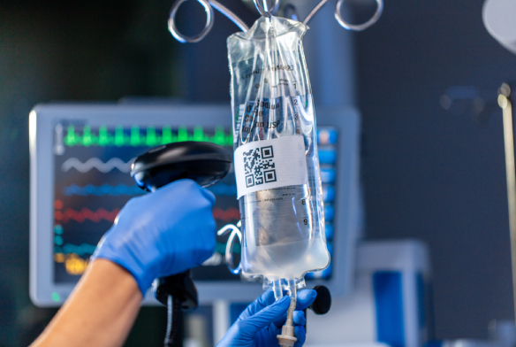 Image of  fluid bag hanging in hospital room