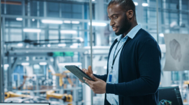 Male employee working on tablet