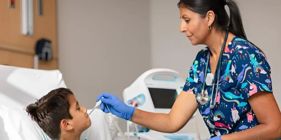 A nurse taking a patient temperature