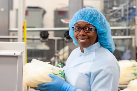 Female employee in uniform working