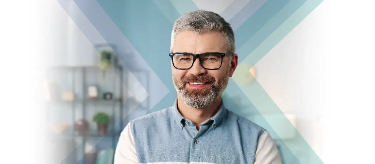 Confident middle-aged man with a beard and glasses