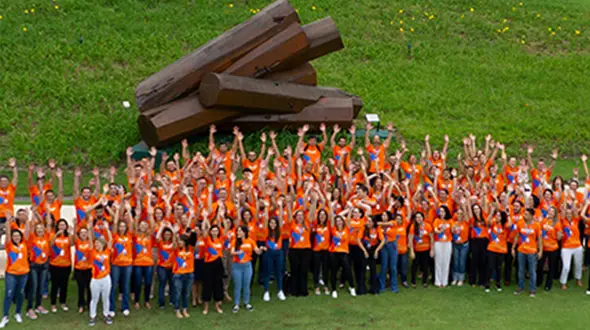 Group photo of Baxter employees in an outside setting